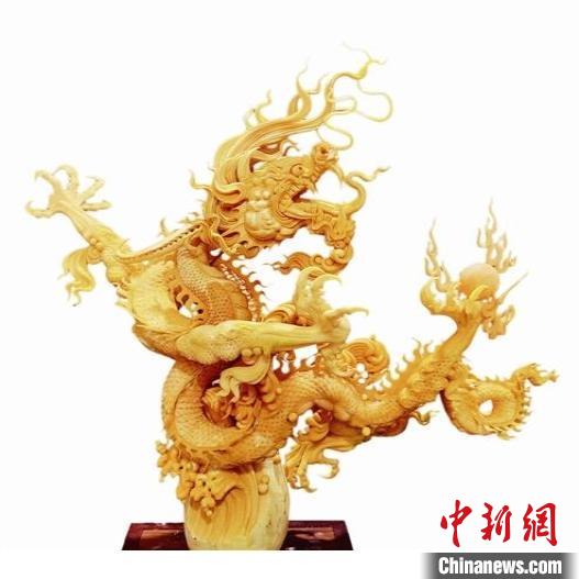 现代版“庖丁解牛”：食雕师手中显“游刃有余”