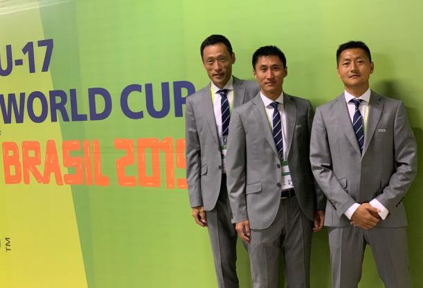 卡塔尔世界杯中国裁判组，从左至右依次为施翔、马宁和曹奕。受访者供图。