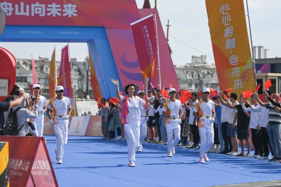 杭州亚运会｜“薪火”凝聚榜样力量――亚运火炬手速写